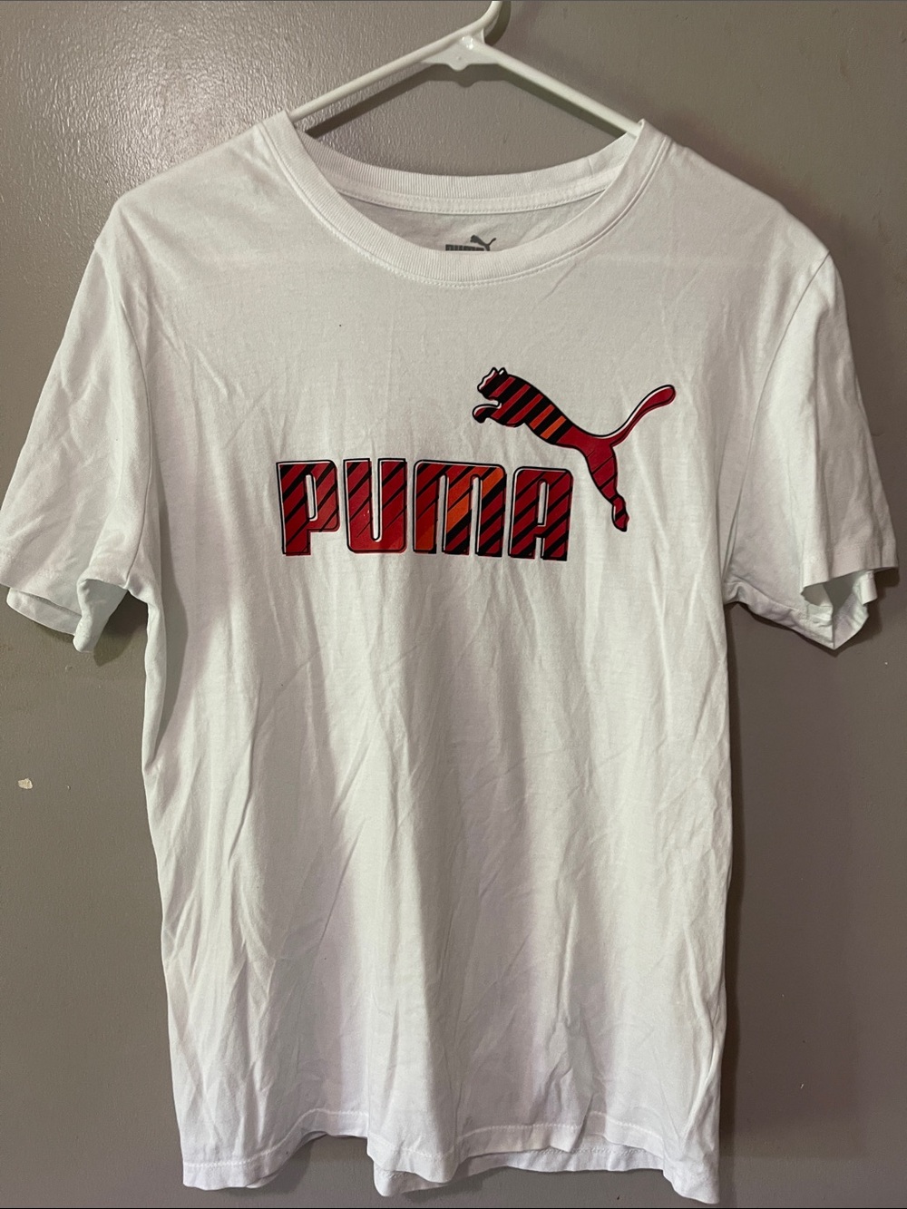 Puma White Short Sleeve Tee with Red Logo